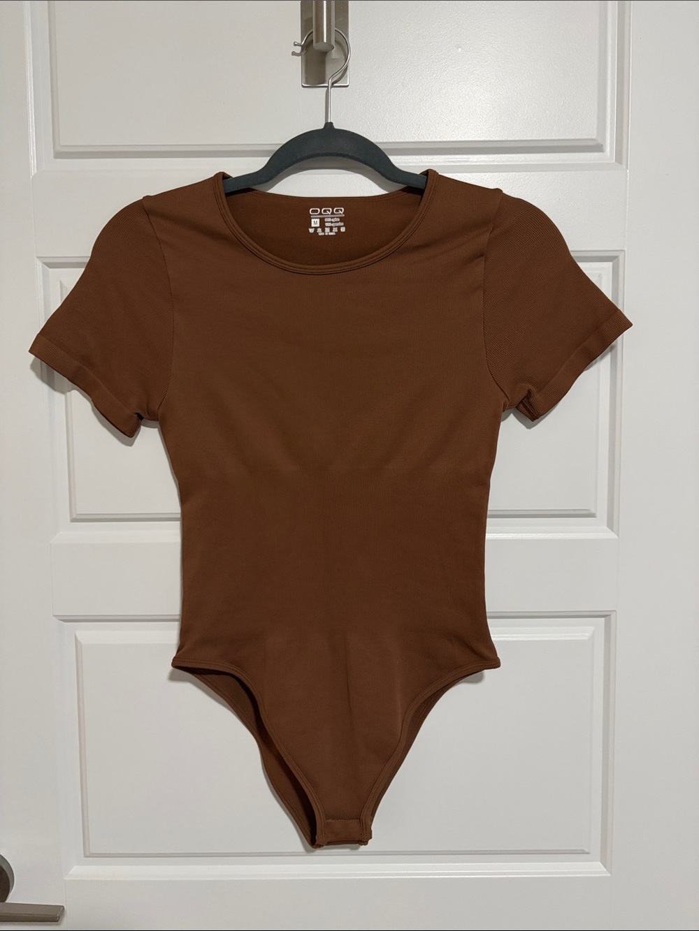Women’s short sleeve brown body suit